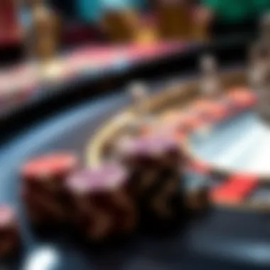 Close-up of casino chips and a roulette wheel